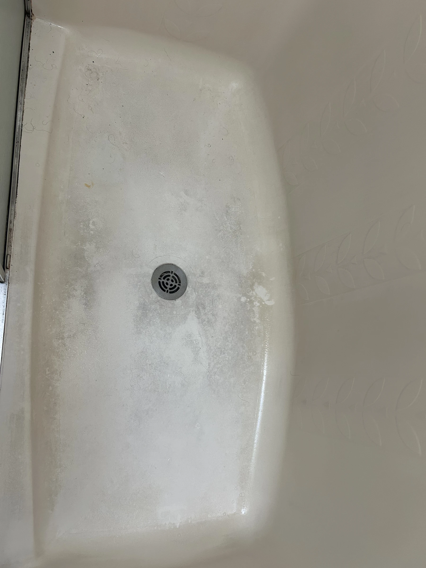 Shower base before cleaning